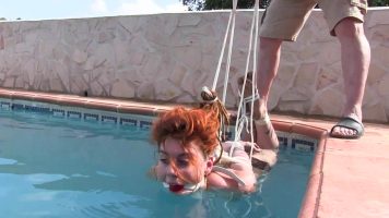 Muriel La Roja Hogtied on Top of the Pool