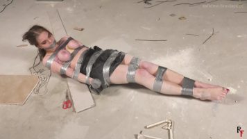 Foxy Captured at the Construction Site 2 – Struggling in Tight Tape Bondage and a Chance to Escape with Scissors