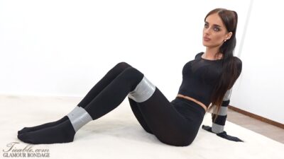 Yelena – Extreme Tape Bondage in Pantyhose Suit
