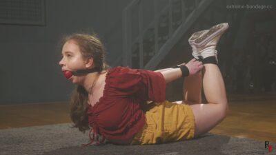 Arina – Struggling in a Hogtie with Massive Ballgag